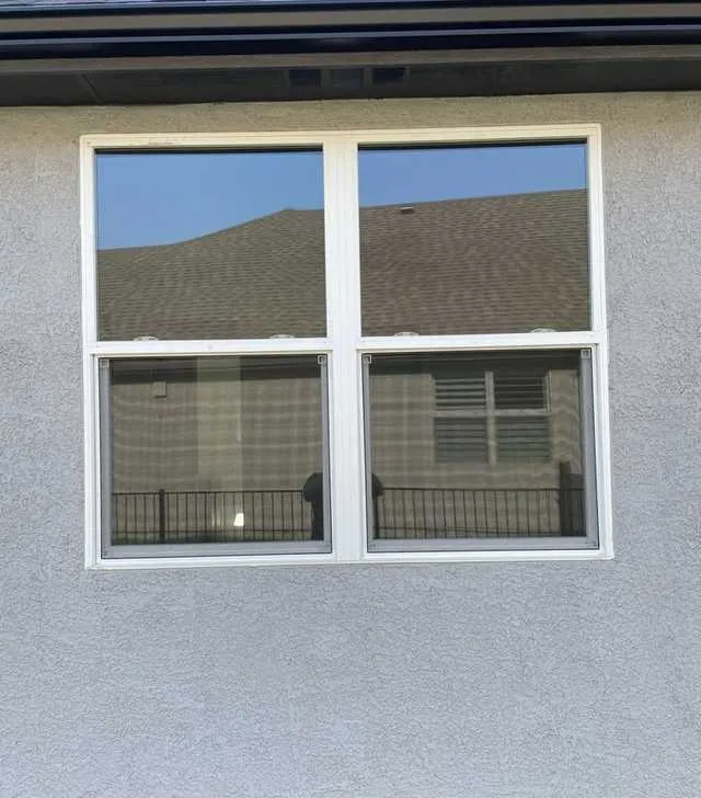 Exterior window and trim on a Lewisville home after cleaning