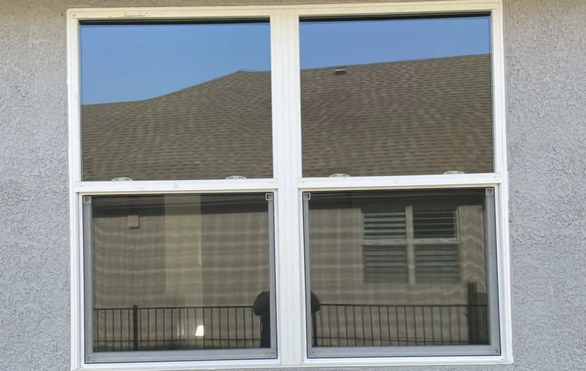 Exterior window and frame on a Lewisville home after cleaning